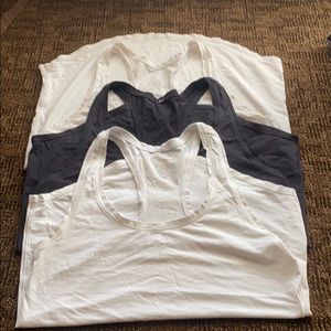 Lot of three lululemon tank 2 white 1 black